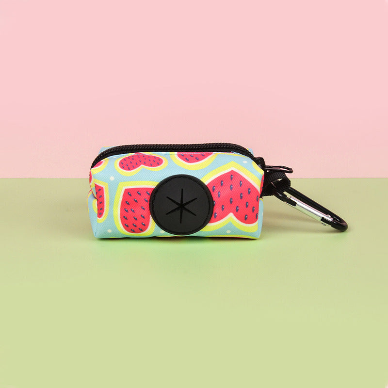 Dog waste bag set in colorful rainforest pattern for trail cleanup