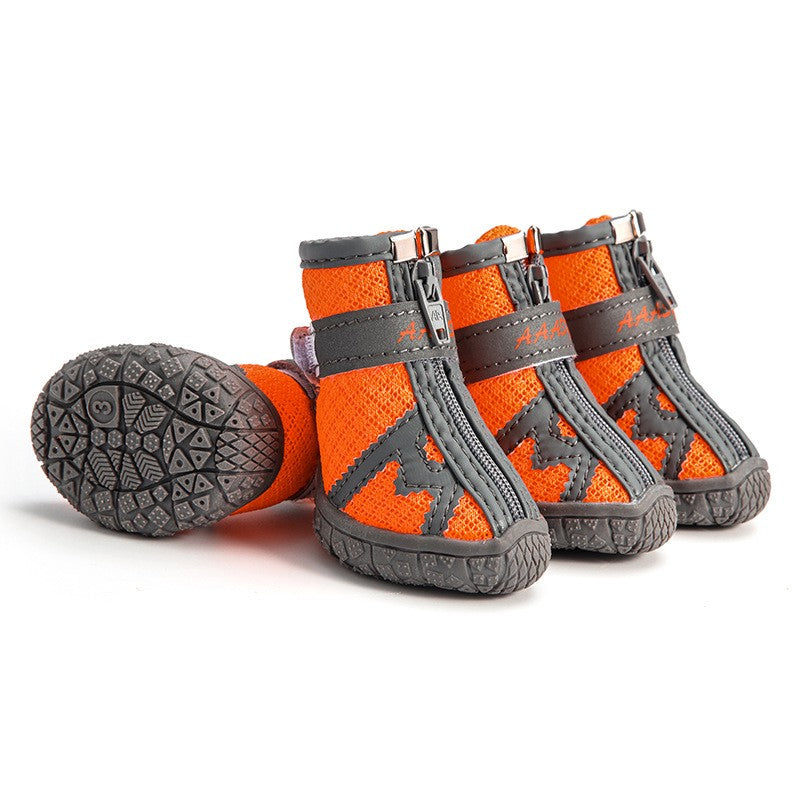 Dog rain boots in green breathable mesh style laid flat