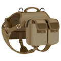 Dog being carried in lightweight trail backpack in army green